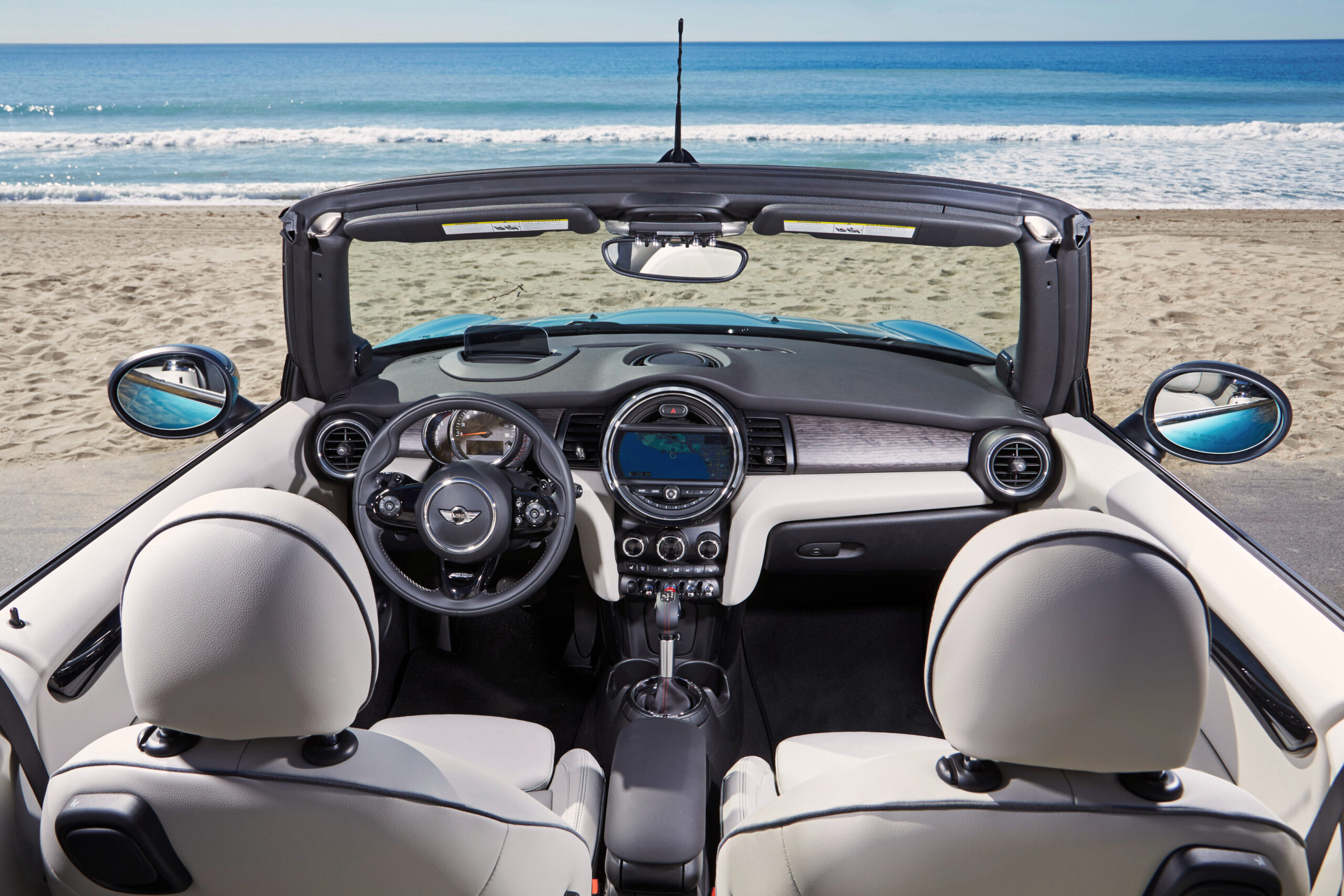 2021 Mini Cooper Convertible white ivory interior, Aqua Caribbean blue exterior -  facing beach


BEST Road-Trip Cars of 2020